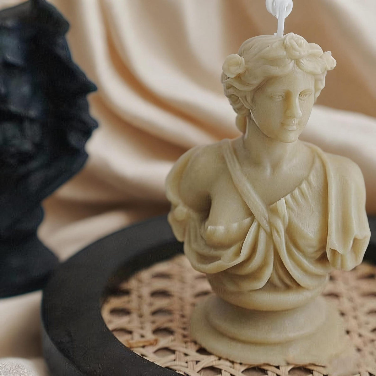 Alternate view of the classical bust candle.