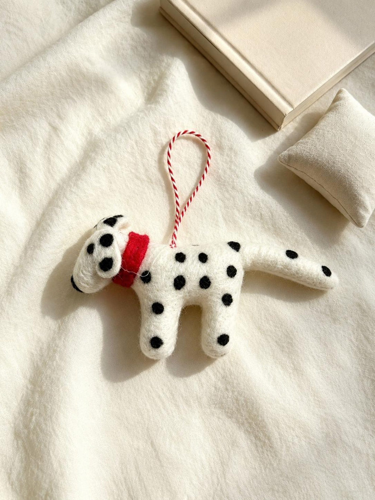 Alternate view of the wool felt animal aroma ornament.