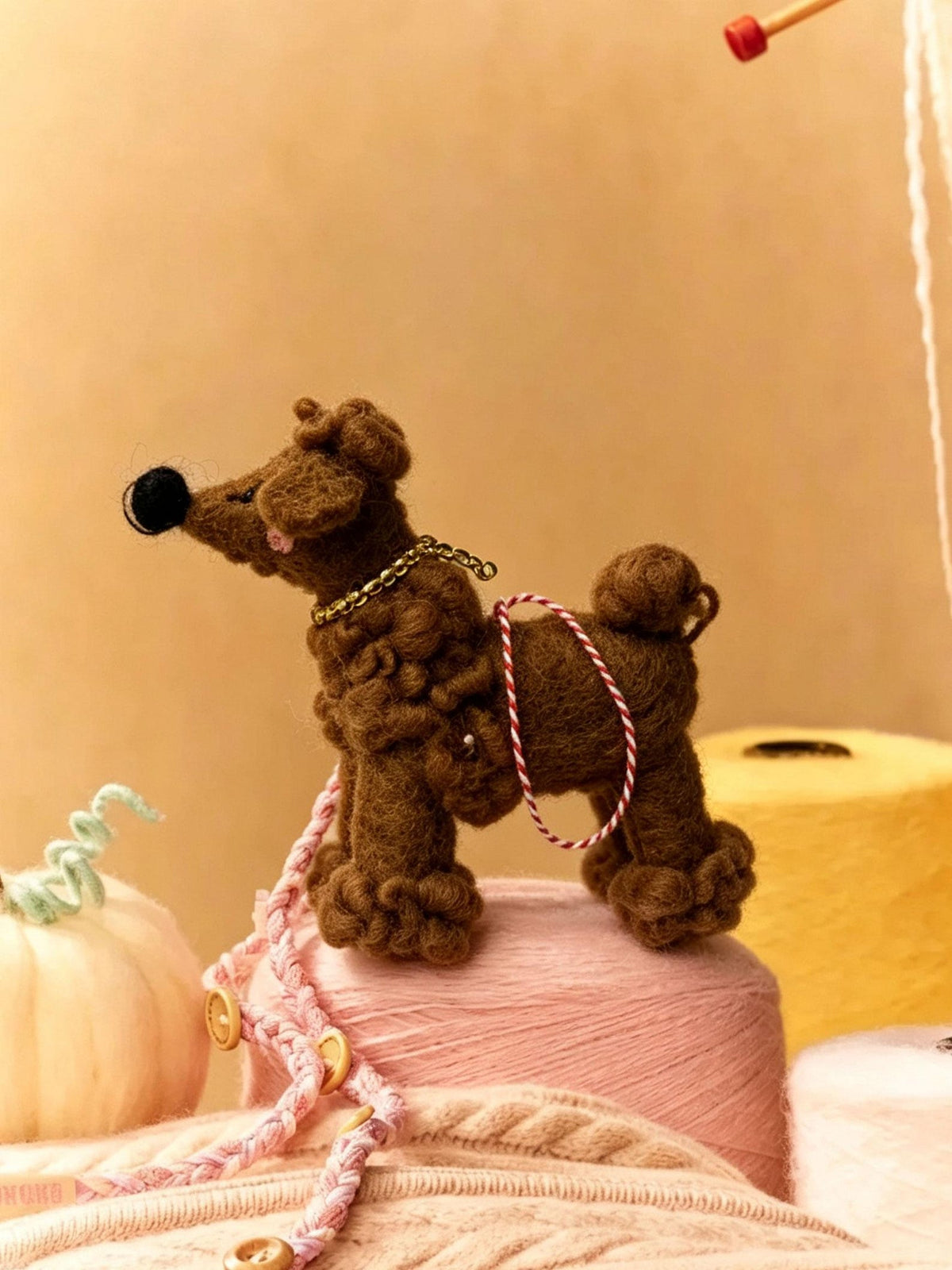Alternate view of the wool felt animal aroma ornament.
