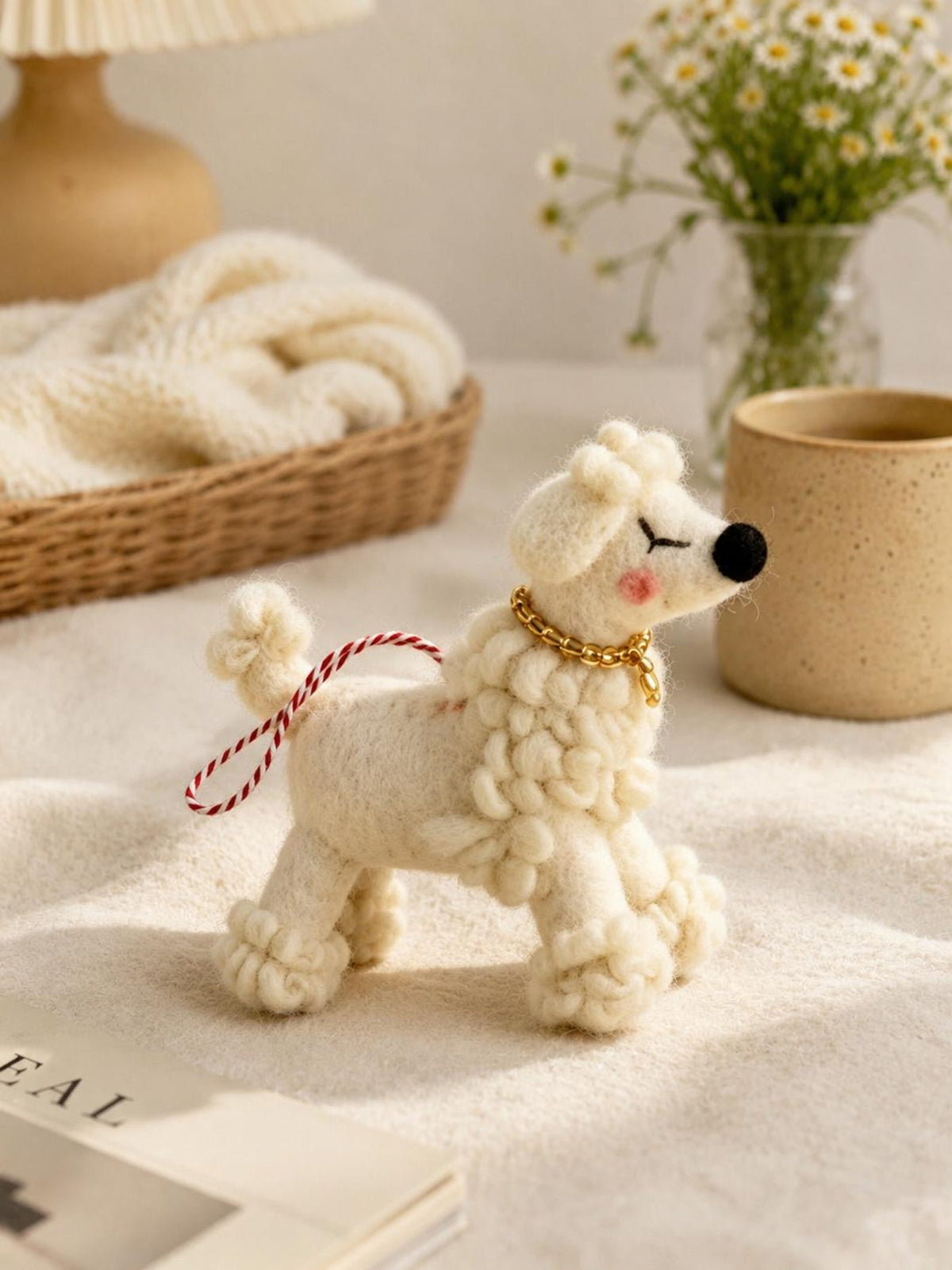 Alternate view of the wool felt animal aroma ornament.