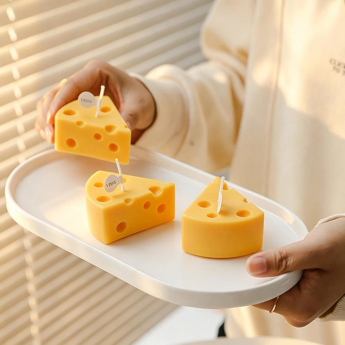 Cheese Candle shown in a product photo.