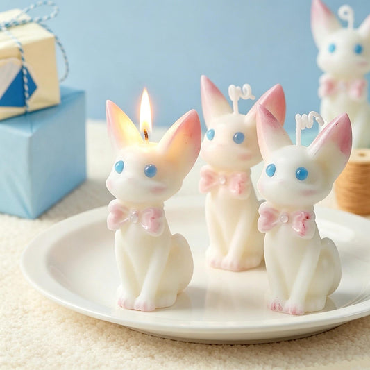 Cat Candle with Pink Bow shown in a product photo.