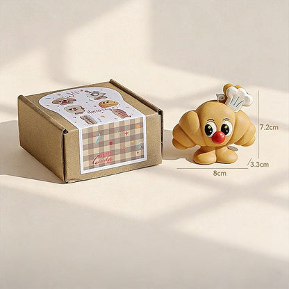 Additional view of the toast & croissant candle set.