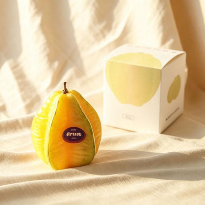 Detail view of the fruit & vegetable candle set.
