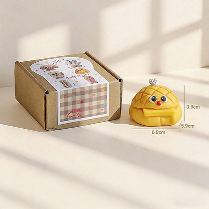 The toast & croissant candle set shown from another angle.