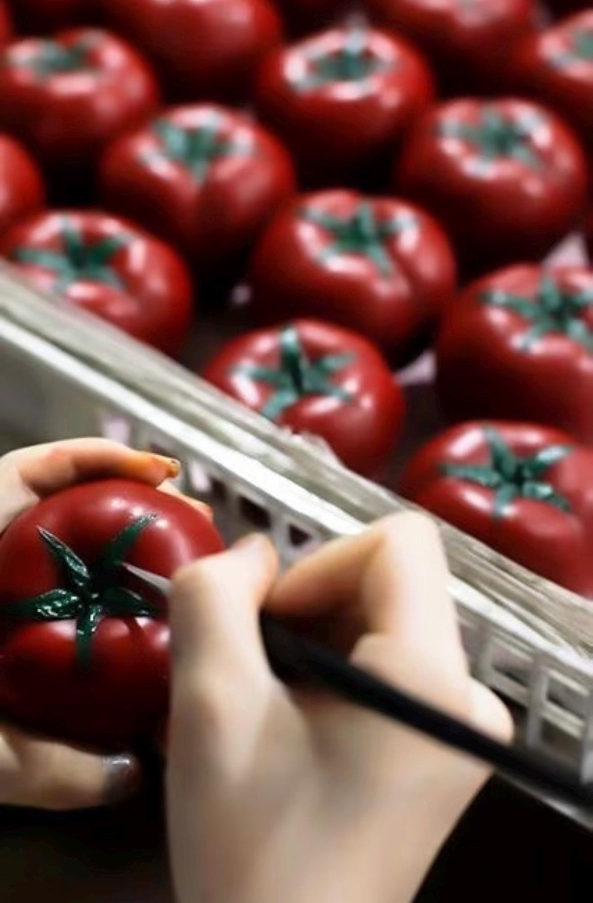 Additional product view of the personalized tomato candle.