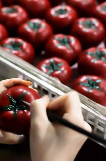 Additional product view of the personalized tomato candle.