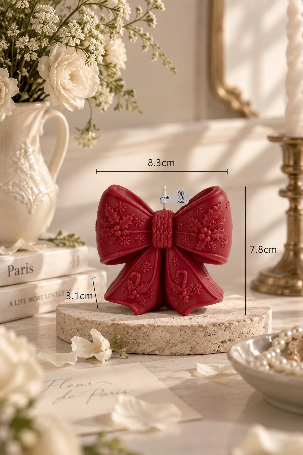 Additional product view of the christmas bow candle.